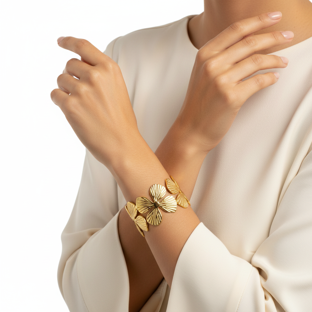Model wearing textured flower cuff bangle - 18k gold plated