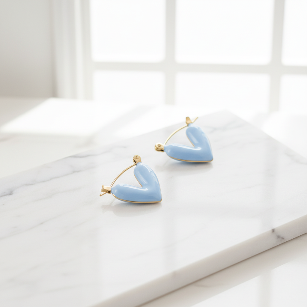 Light Blue Triangle Earrings on Studio Countertop