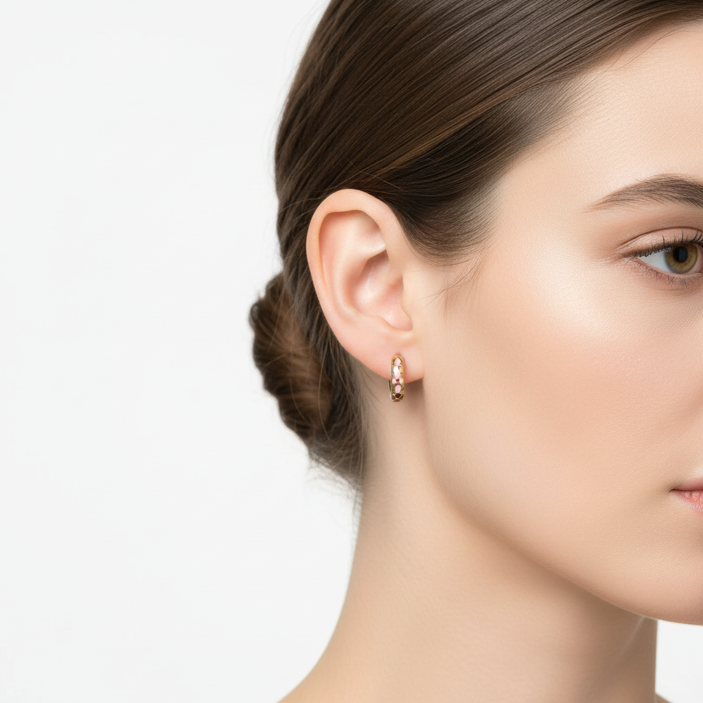 Model wearing small floral hoops - front view