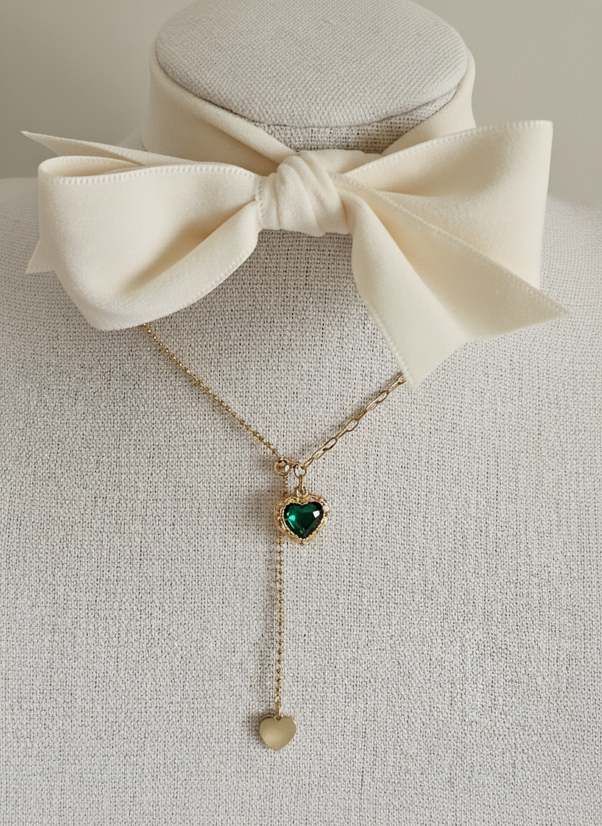 Necklace display with ivory ribbon